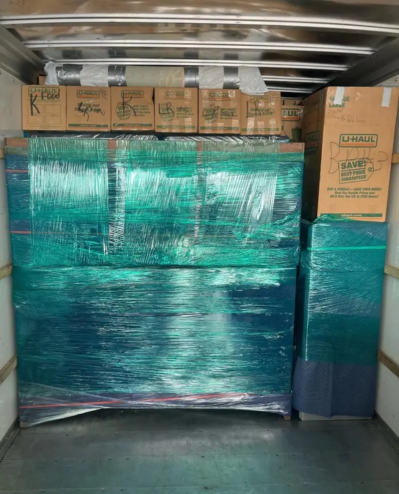 Shrink-wrapped and secured boxes ready for a safe move